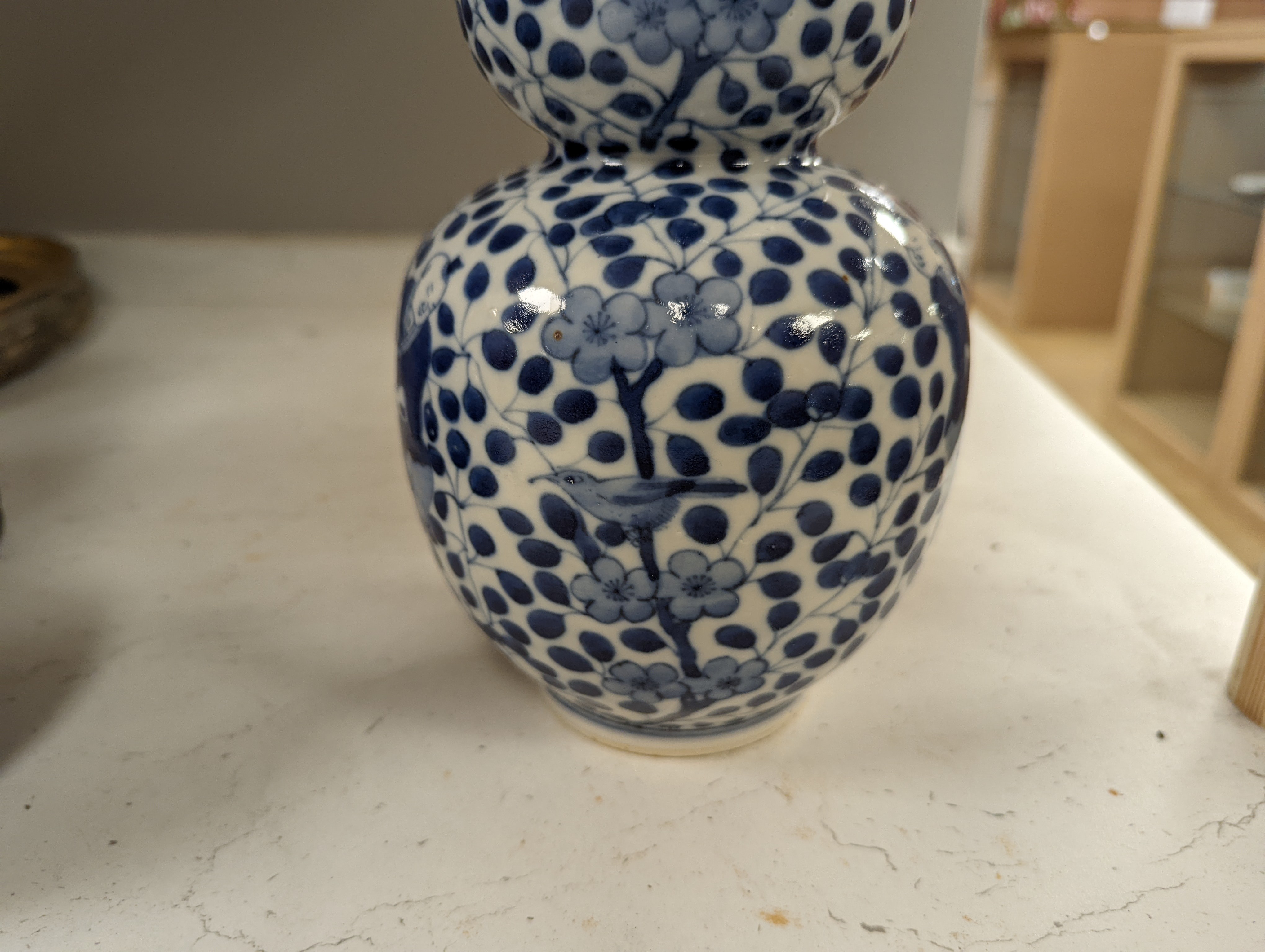 Two Chinese blue and white vases, tallest 29cm
